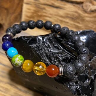 chakra bracelet on lava