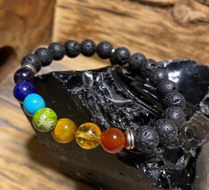 chakra bracelet on lava